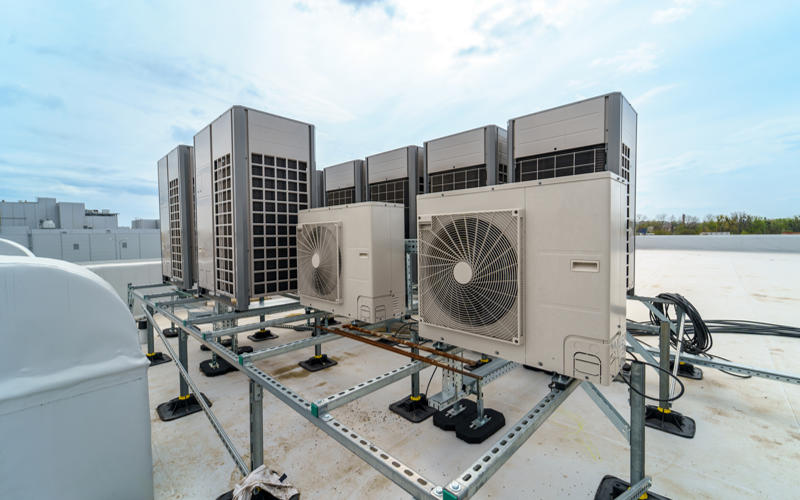 Multizone air conditioning and ventilation system. Outdoor units on the roof of a large industrial building.