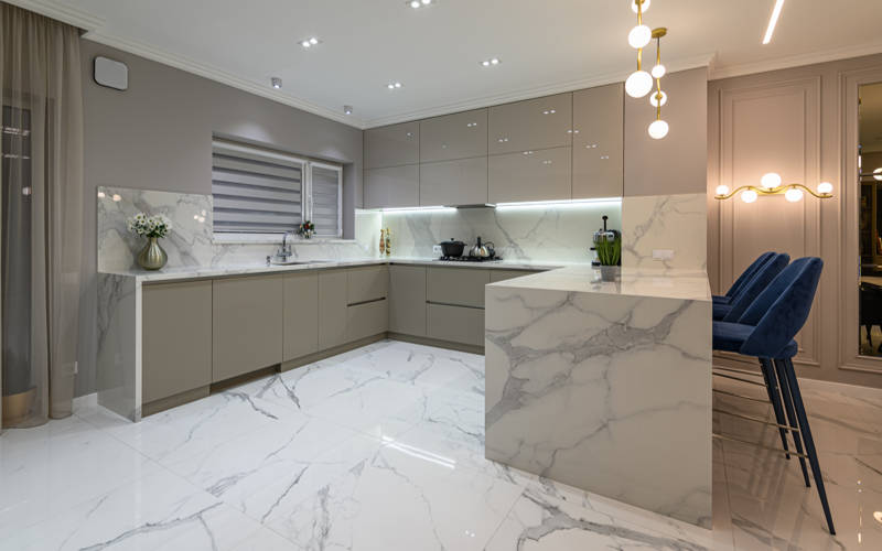 Luxury large modern white marble kitchen united with dining room and living room