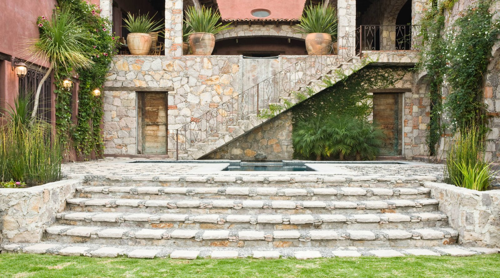 modern landscaping cost in Dubai villa outdoor space by Parallax Technical Services LLC